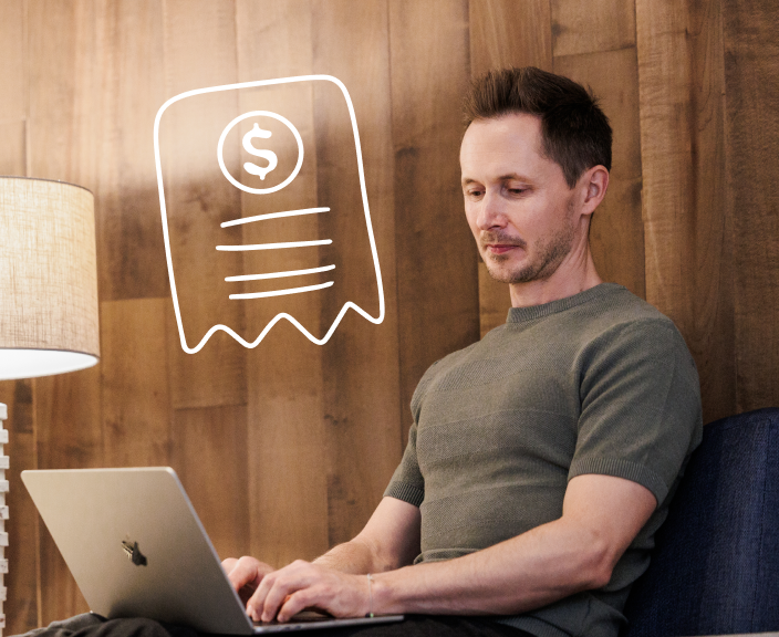 Man using laptop with digital receipt icon displaying dollar sign