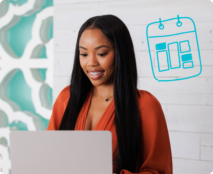 Woman in orange blazer smiling while working on laptop with calendar icon overlay