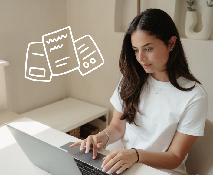 Woman typing on laptop with document icons floating above, representing digital content creation or online work
