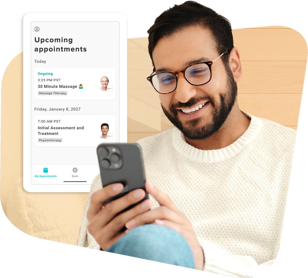 Man with glasses and beard smiling while looking at smartphone, with appointment scheduling interface showing upcoming massage therapy and physiotherapy sessions