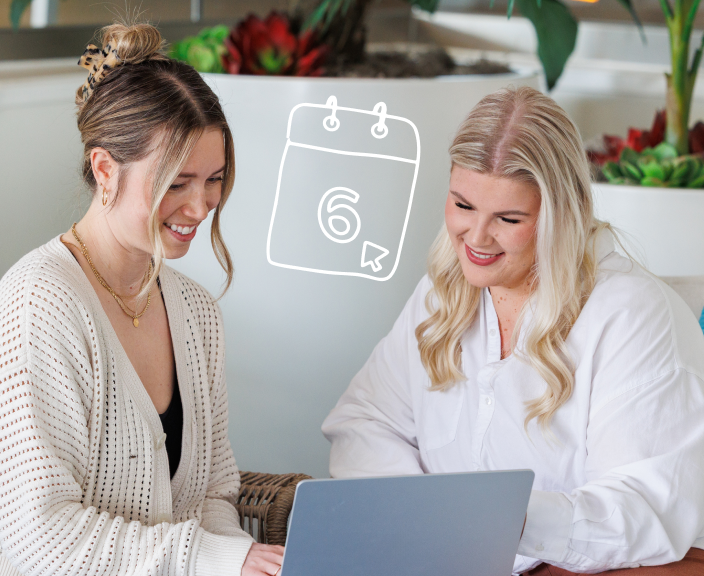 Two women smiling while looking at a laptop together, with a calendar icon showing the number 6 overlaid on the image