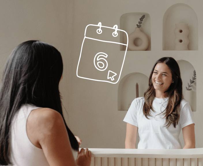 Two women having a conversation with a calendar icon showing the number 6 overlaid on the image