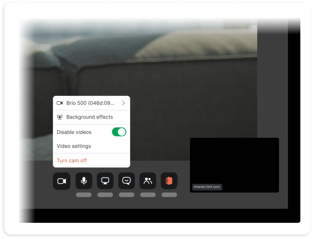 Video call interface showing camera menu with options for background effects, disable videos toggle, video settings, and turn cam off, plus control buttons for camera, microphone, chat, reactions, accessibility, and recording