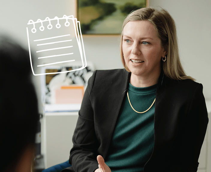 Woman in business attire speaking with a digital notepad icon overlay suggesting planning or organization