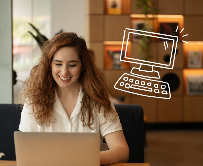 Woman smiling while working on a laptop, with a computer icon graphic overlaid